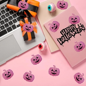 Pink glitter Halloween pumpkin stickers with shiny Jack-o'-lantern festive designs