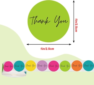 Detail of 1-inch colorful round Thank You stickers in roll format for gift packaging