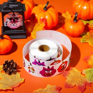 Halloween cartoon sticker roll with pumpkin and ghost patterns for festive gift wrapping