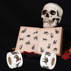 Detailed view of colorful Day of the Dead cat skull stickers on vintage book backgrounds