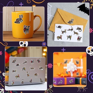 Detail showing Day of the Dead cat skull stickers applied on mugs, laptops, and gift boxes