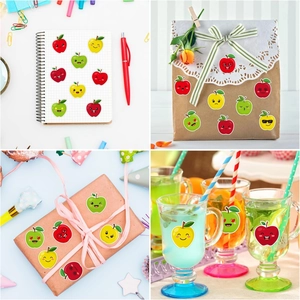 Detailed view of colorful apple stickers decorating notebooks and gift packaging boxes