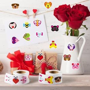 Close-up of cute cartoon animal stickers applied on gift boxes and vases for decoration