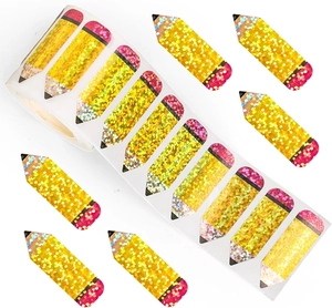 Macro shot of pencil-shaped laser glitter stickers in a roll with sparkling details