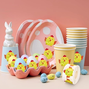 Holographic Easter chick stickers on party plates and cups with a roll of labels