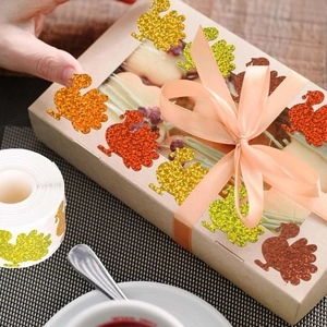 Glittery turkey stickers on kraft paper cookie gift box for Thanksgiving decoration