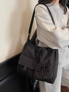 Japanese style large capacity black nylon drawstring messenger bag for daily casual use