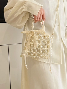 Handmade pearl woven handbag with lace bow and satin drawstring inner bag for women