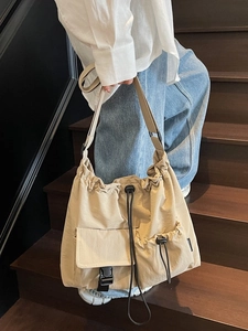 Japanese style beige large capacity drawstring canvas shoulder bag for casual student use