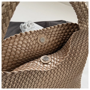 Detailed close-up of tight woven texture and secure double magnetic buckle closure
