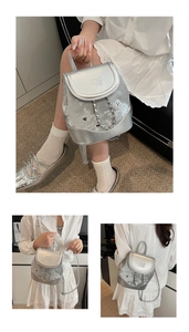 Detail of silver mini backpack with chain strap and stylish letter print for women