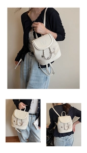 Multiple views of mini off-white chain backpack with star and paw print embossing