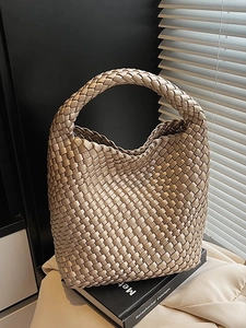 Fashion champagne gold woven hobo bag with intrecciato texture and top handle