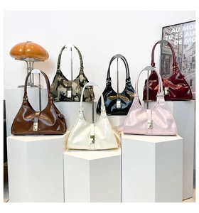 Detailed close-up showing six color variations of stylish glossy hobo bags with metal buckles