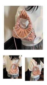 Pink pleated cloud bag with elegant pearl chain strap and polished synthetic leather finish