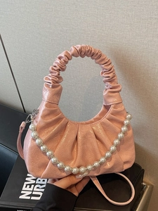 Chic pink ruched cloud bag with large pearl chain and elegant top handle for women