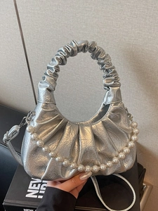 Silver metallic pleated dumpling bag with pearl chain and detachable strap for women