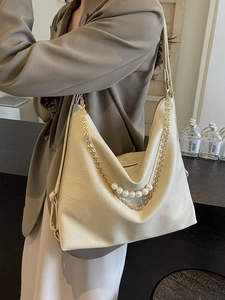 Off-white large capacity tote bag with pearl chain detail and pleated leather texture