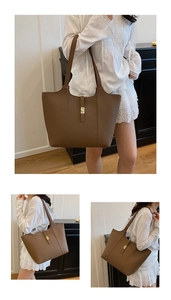 Close-up of dark brown lychee texture leather tote bag with gold metal turn lock