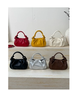 Cloud dumpling handbags in six colors showing leather texture and knot handle details