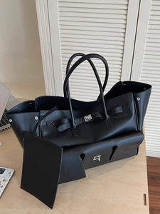 Black matte leather tote bag with silver metal swivel clasp and matching clutch insert