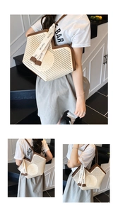 Close-up of laser-cut geometric tote bag with brown leather trim and woven letter strap