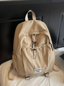Minimalist beige nylon backpack for women with large capacity and multi-pocket design