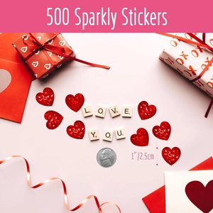 Macro detail of 1 inch red holographic heart stickers with sparkly geometric texture