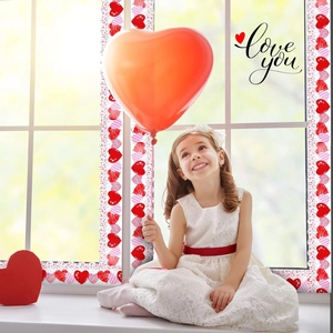 Valentine's Day heart-themed border stickers applied on window for festive decoration