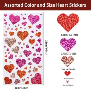 Guida alle taglie per adesivi glitterati a cuore con dimensioni in pollici e centimetri
