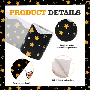 Detail of self-adhesive gold star border stickers on a black background roll