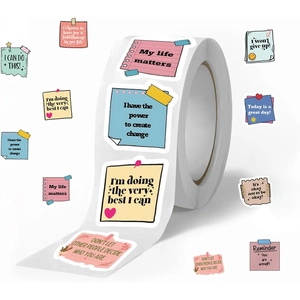 Detail view of colorful motivational paper roll stickers with inspirational quotes