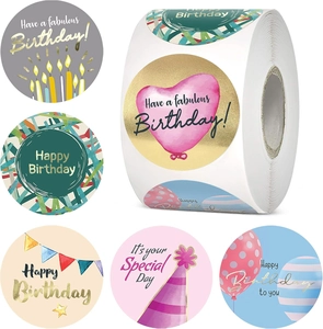 Macro view of birthday sticker roll with gold foil lettering and colorful party designs