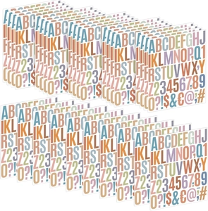 Macro view of multi-color Morandi alphabet and number sticker sheets for DIY decor