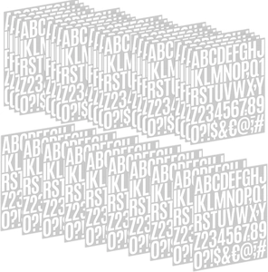 Multiple sheets of DIY alphabet and number stencils featuring uppercase letters and symbols