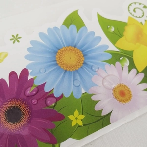 Macro detail of waterproof floral border stickers with realistic water droplets on PVC