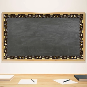 Detail of Congrats Grad bulletin board border stickers with gold fireworks on chalkboard