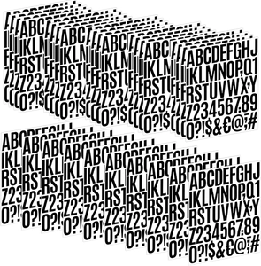 Stack of white alphabet stickers with black bold letters A-Z and numbers 0-9