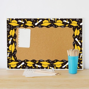 Detail of wavy edge graduation bulletin board border with yellow caps and stars