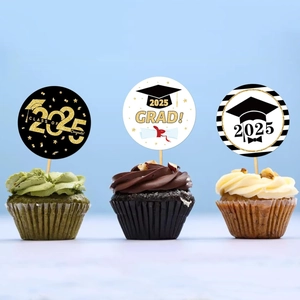 Detail of 2025 graduation cupcake toppers with diverse gold and black festive patterns