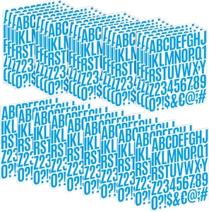 Macro shot of waterproof bright blue DIY alphabet and number stickers with glossy finish