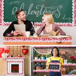 Scalloped Valentine heart borders decorating a classroom blackboard and store shelves