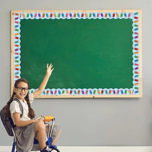 Classroom chalkboard decorated with colorful pencil pattern wavy border stickers for teachers