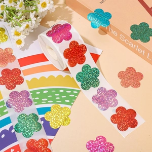 Macro shot of glitter flower stickers on a book with vibrant holographic finish