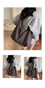 Close-up of brown checkered tote bag showing soft texture and large capacity design