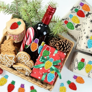 Glitter Christmas light bulb stickers on gift boxes and wine bottles for holiday decor