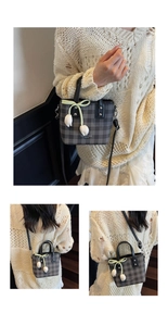 Detail showing checkered crossbody bag with tulip charm and fashion logo print