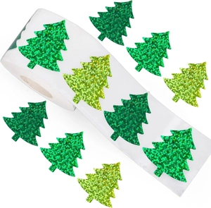 Detail of glitter Christmas tree stickers roll with shimmering green holiday textures