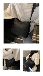 Detailed close-up of classic quilted stitching pattern on black crossbody tote bag