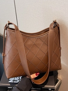 Classic dark brown quilted shoulder bag with diamond stitching and double wide leather straps